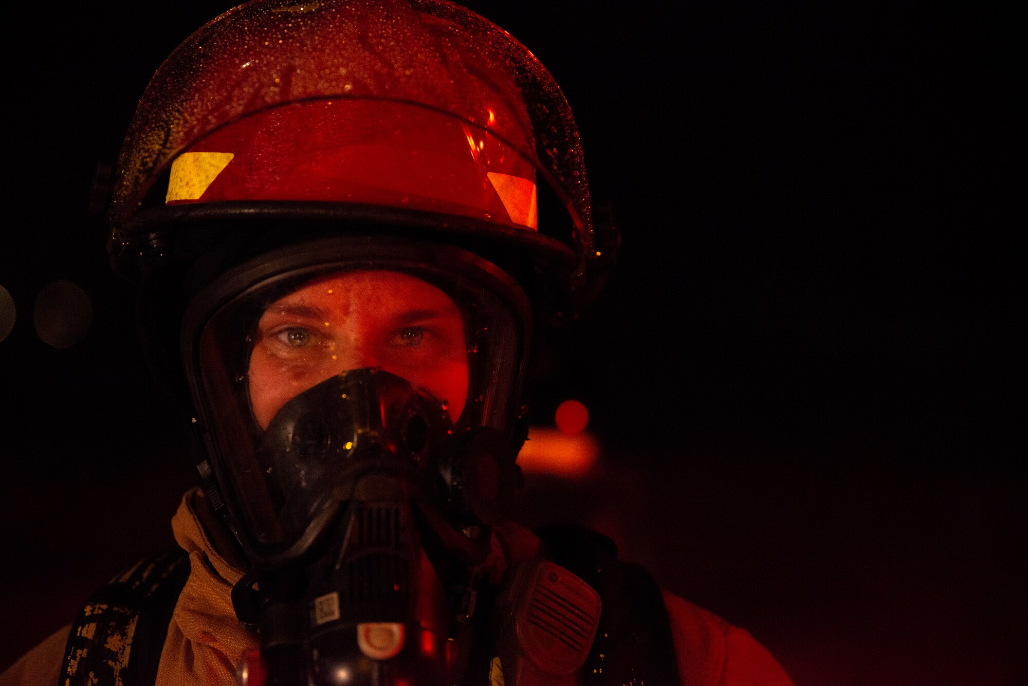 Staff Sgt. Kami Clarkson, 379th Expeditionary Civil Engineer Squadron lead firefighter, participates in live-fire training exercise August 10, 2021, at Al Udeid Air Base, Qatar.