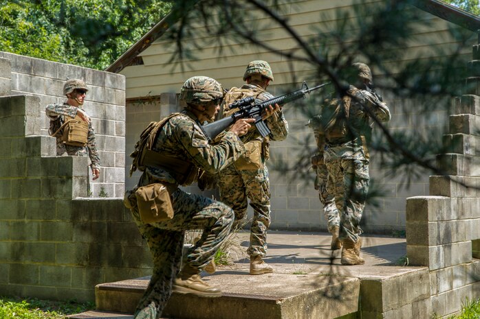 Marines with Alpha Company, Marine Barracks Washington, conduct military operations in urban terrain training at Marine Corps Base Quantico, Va., 11 July, 2021.