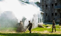 Marines with Alpha Company, Marine Barracks Washington, conduct military operations in urban terrain training at Marine Corps Base Quantico, Va., 11 July, 2021.