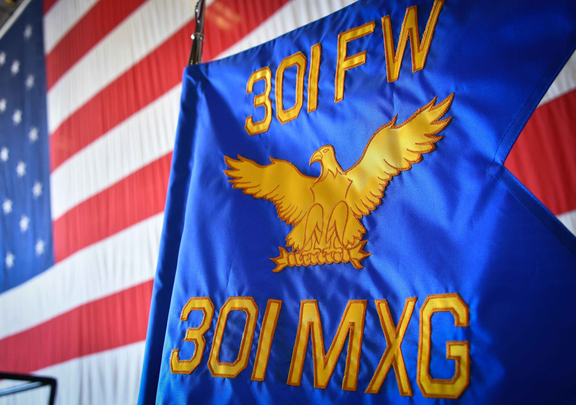 This 301 FW Maintenance Group guideon was given to Col. John Nemecek, the incoming 301 FW MXG commander, August 8, 2021, during at change of command ceremony at U.S. Naval Air Station Joint Reserve Base Fort Worth, Texas. This military tradition symbolizes the transfer of unchallenged authority passed to the new commander to lead their unit. (U.S. Air Force photo by Master Sgt. Jeremy Roman)