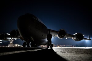 An Airman assigned to the 911th Aircraft Maintenance Squadron inspects a C-17 as part of Operation Steel Moose ’21 at the Pittsburgh International Airport Air Reserve Station, Pennsylvania, Aug. 6, 2021. Operation Steel Moose ’21 is a pre-deployment exercise designed to test the wartime capabilities of the 911th Airlift Wing.
