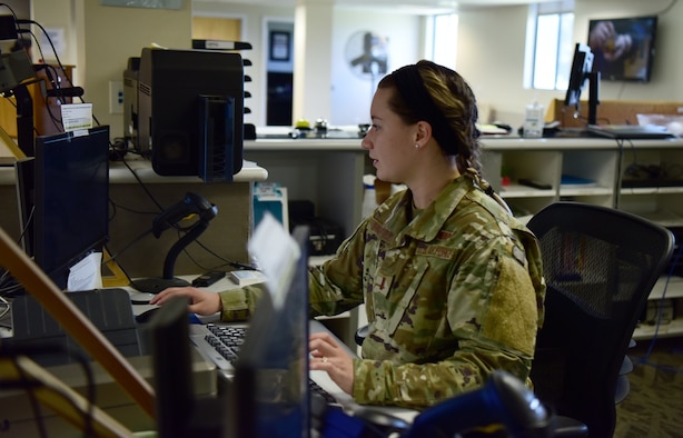U.S.  Air Force, 2nd Lt. Gabrielle Prentice, Officer in Charge over customer support at the Military Personnel Flight office on Vandenberg Space Force Base, July 28, 2021. 2nd Lt. Prentice is working on some paperwork to help one of her customers that contacted her through email. (U.S. Space Force photo by Airman First Class Tiarra Sibley)