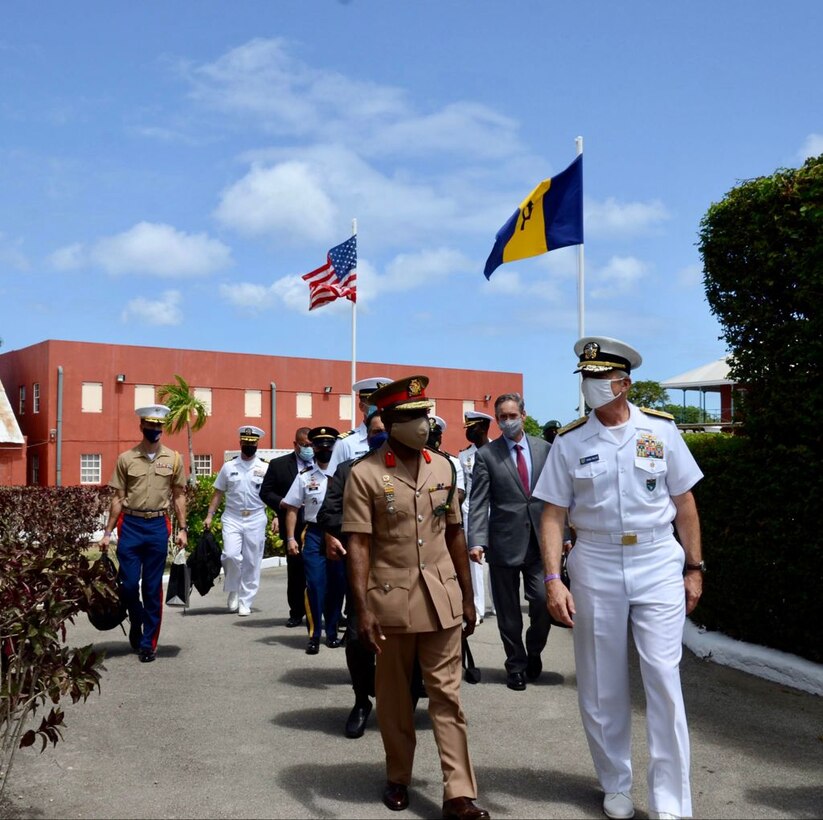 U.S. Navy Adm. Craig S. Faller, commander of U.S. Southern Command, is welcomed to Barbados Defence Force headquarters by Col. Glyne Grannum.