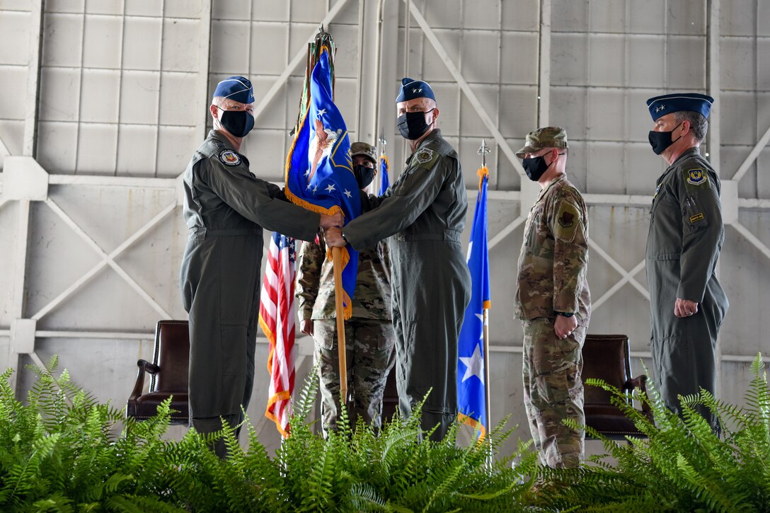 U.S. Air Force Maj. Gen. Chad P. Franks, outgoing commander of Fifteenth Air Force, relinquishes command to Maj. Gen. Michael G. Koscheksi, the incoming commander of Fifteenth Air Force, at the change of command ceremony for Fifteenth Air Force at Shaw Air Force Base, S.C., Aug. 13, 2021. Fifteenth Air Force is responsible for ensuring the agile combat support capabilities of 13 wings and three direct reporting units, preparing Airmen for the dynamic requirements of air, space and cyberspace of the future. These units encompass about 600 aircraft and more than 47,000 active duty and civilian members. Fifteenth Air Force is also responsible for the operational readiness of 16 National Guard and Air Force Reserve Units. (U.S. Air Force photo by Tech. Sgt. Megan Floyd)