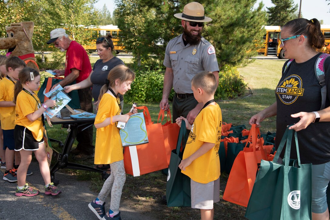 Justin Kerwin, senior park ranger with the U.S. Army Corps of Engineers – Alaska District, welcomes students on Aug. 5 to the Chena River Lakes Flood Control Project near North Pole, Alaska.