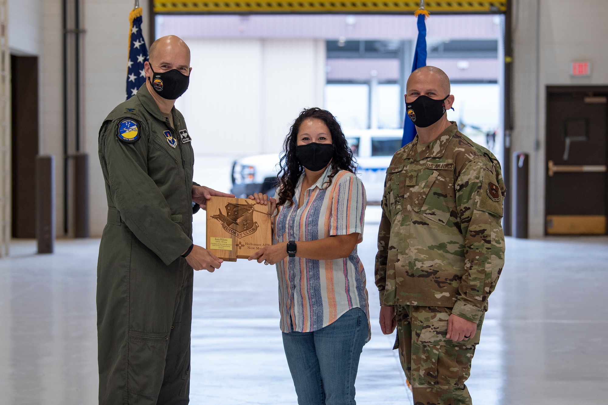 Kerin Williams, quarterly award winner, accepts the Civilian Category II Non-Supervisory of the quarter award during the 49th Wing’s 2nd quarter award ceremony, Aug. 13, 2021, on Holloman Air Force Base, New Mexico. Quarterly award winners were selected based on their technical expertise, demonstration of leadership and job performance. (U.S. Air Force photo by Airman 1st Class Jessica Sanchez)