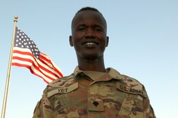 Unit Supply Specialist Spc. Fourtytwo Yet, an Iowa National Guardsman assigned to the 3654th Support Maintenance Company, was born in Southern Sudan before moving to the United States. He is currently working to pursue his dream of becoming an Army officer.  (U.S. Army photo by. Sgt. Marquis Hopkins)