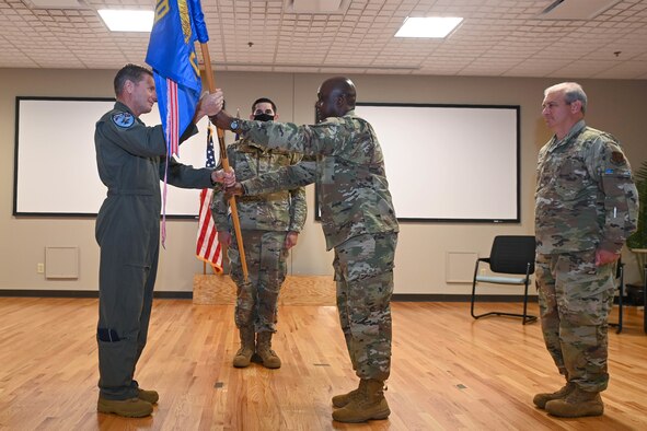 U.S. Air Force Chief Master Sgt. Isaac Carr assumes responsibility as the new State Command Chief for the South Carolina Air National Guard (SCANG) during a ceremony at McEntire Joint National Guard Base, South Carolina, August 14, 2021. The presiding officer is U.S. Air Force Brig. Gen. Scott Bridgers, Assistant Adjutant General, Air. Carr is the fourteenth State Command Chief for the SCANG and takes over from U.S. Air Force Chief Master Sgt. Kevin Thomas who is retiring. In his new role, Carr will be the enlisted advisor for senior SCANG leadership. (U.S. Air National Guard photo by Tech. Sgt. Megan Floyd, 169th Fighter Wing Public Affairs)