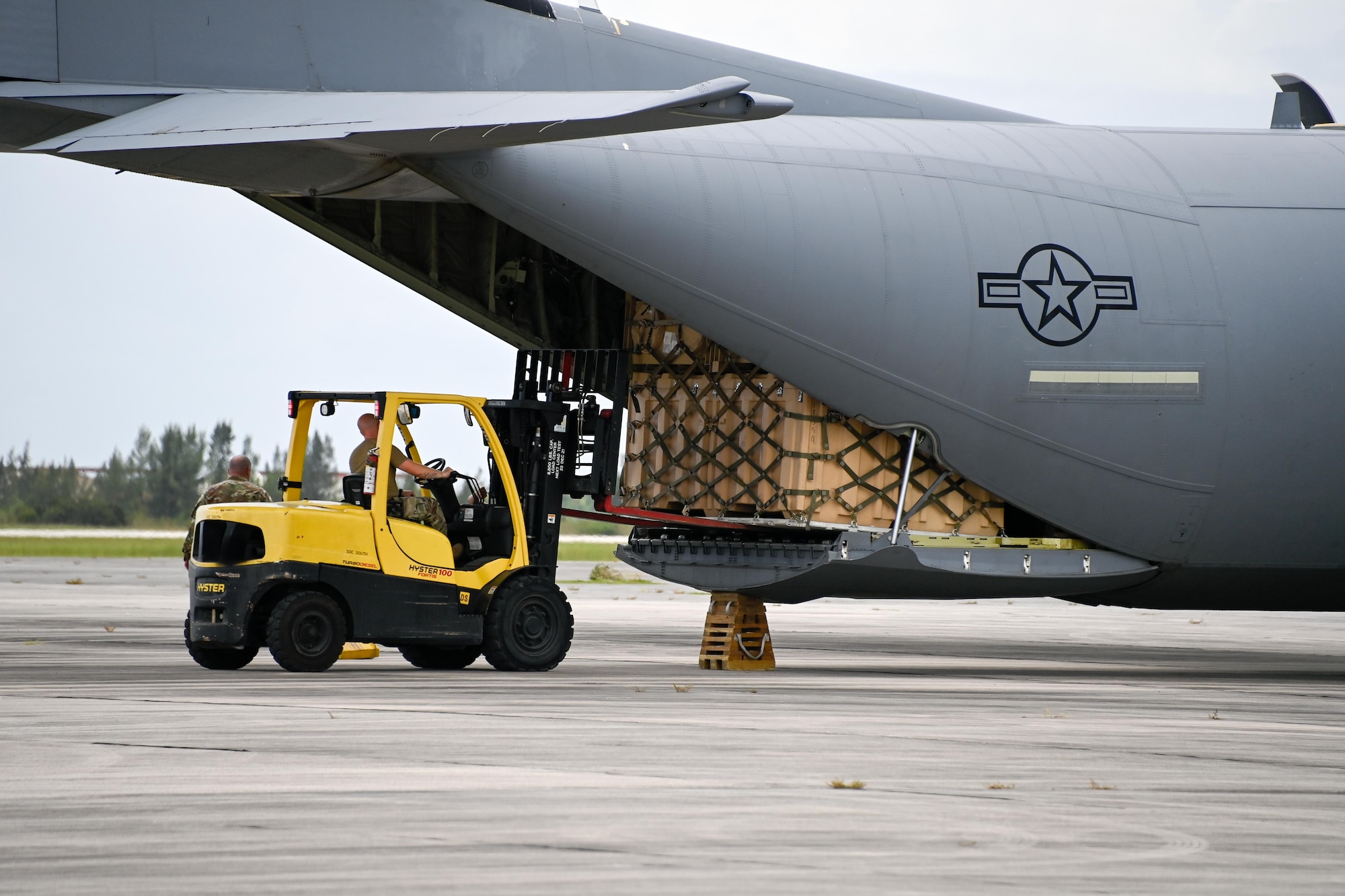 Image of supplies being loaded into aircraft.