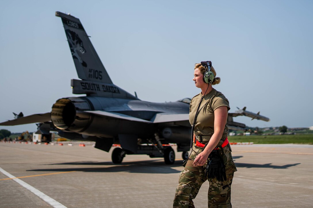 U.S. Air Force Staff Sgt. Mikayla Wilson, crew chief, 114th Aircraft Maintenance, South Dakota National Guard, goes through launch procedures during the readiness exercise Aug. 9, 2021, at Joe Foss Field, S.D. The readiness exercise is designed to enhance the warfighter ethos of mission-type orders, independent decision making, and risk management at the lowest competent level by testing the 114th Fighter Wing’s ability to set up an alert sight and generate combat airpower on short notice. (U.S. Air National Guard photo by Tech. Sgt. Duane Duimstra)