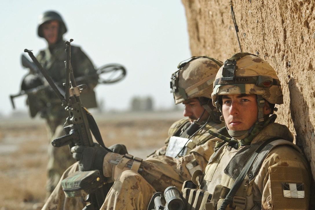 Canadian and Afghan national army soldiers patrol in Badula Qulp, Helmand province, Afghanistan, Feb. 17, 2010, during Operation Helmand Spider. (U.S. Air Force photo by Tech. Sgt. Efren Lopez)