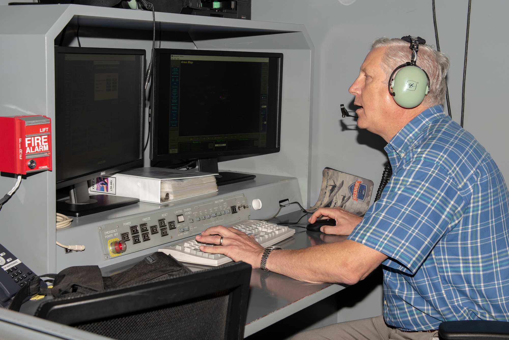 David M. Loftus, 47th Operations Group director of academics & simulator training, monitors the controls and inputs the parameters of a student’s simulated flight at Laughlin Air Force Base, Texas on Jul. 19, 2021. The simulators are state of the art equipment that can replicate any environment or situation that they may face when piloting the aircraft. (U.S. Air Force photo by Airman 1st Class David Phaff)
