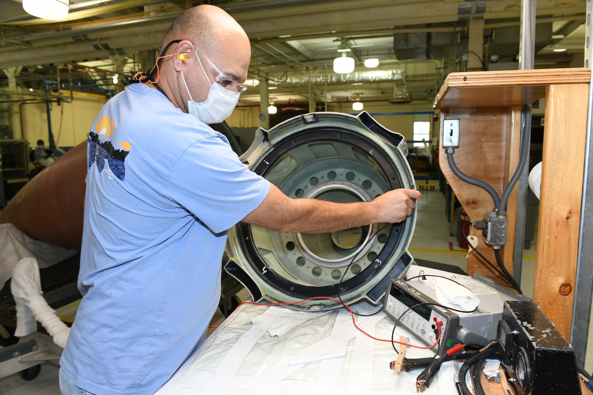 man using electrical tester