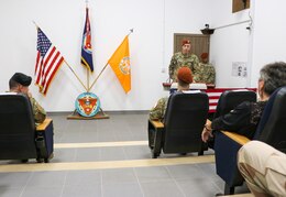 SINAI PENINSULA, Egypt - Col. Matthew Archambault (center right), the incoming commander of Task Force Sinai, addresses members of Task Force Sinai and the Multinational Force and Observers during a change of command ceremony at the MFO Headquarters Auditorium at South Camp, Sinai, Egypt August 15, 2021. “I am honored by this opportunity to participate in this historic mission that is Task Force Sinai and the Multinational Force and Observers,” Archambault said. “In the short week that I’ve been here, I’ve been awed by the impact this Task Force has in the region and I humbly join the ranks.”