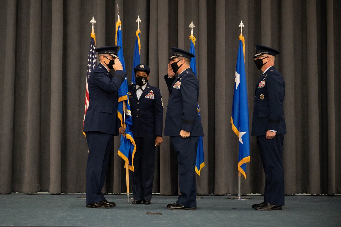 Maj. Gen. Andrew Gebara, center, incoming 8th Air Force and Joint-Global Strike Operations Center commander, renders a salute to Gen. Tim Ray, left, commander of Air Force Global Strike Command, during a change of command ceremony at Barksdale Air Force Base, La., August 16, 2021. A change of command is a military tradition that represents a formal transfer of authority and responsibility for a unit from one commanding or flag officer to another. (U.S. Air Force photo by Senior Airman Jovante Johnson)