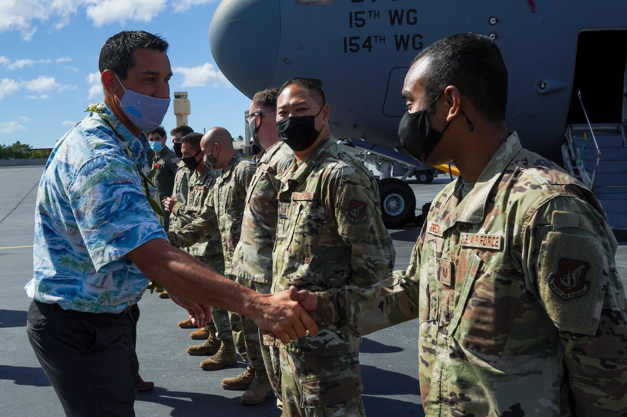Congressman Kaiali’i Kahele, representative of Hawai’i’s 2nd congressional district, and Serena Li, military-liaison assistant to Congressman Kahele, visit with Airmen from the 15th Wing at Joint Base Pearl Harbor-Hickam, Hawaii, August 12, 2021. Kahele and Li spoke with leaders, servicemembers, and civilians regarding COVID-19 protocols, readiness, and maximization of resources. (U.S. Air Force photo by Airman 1st Class Makensie Cooper)