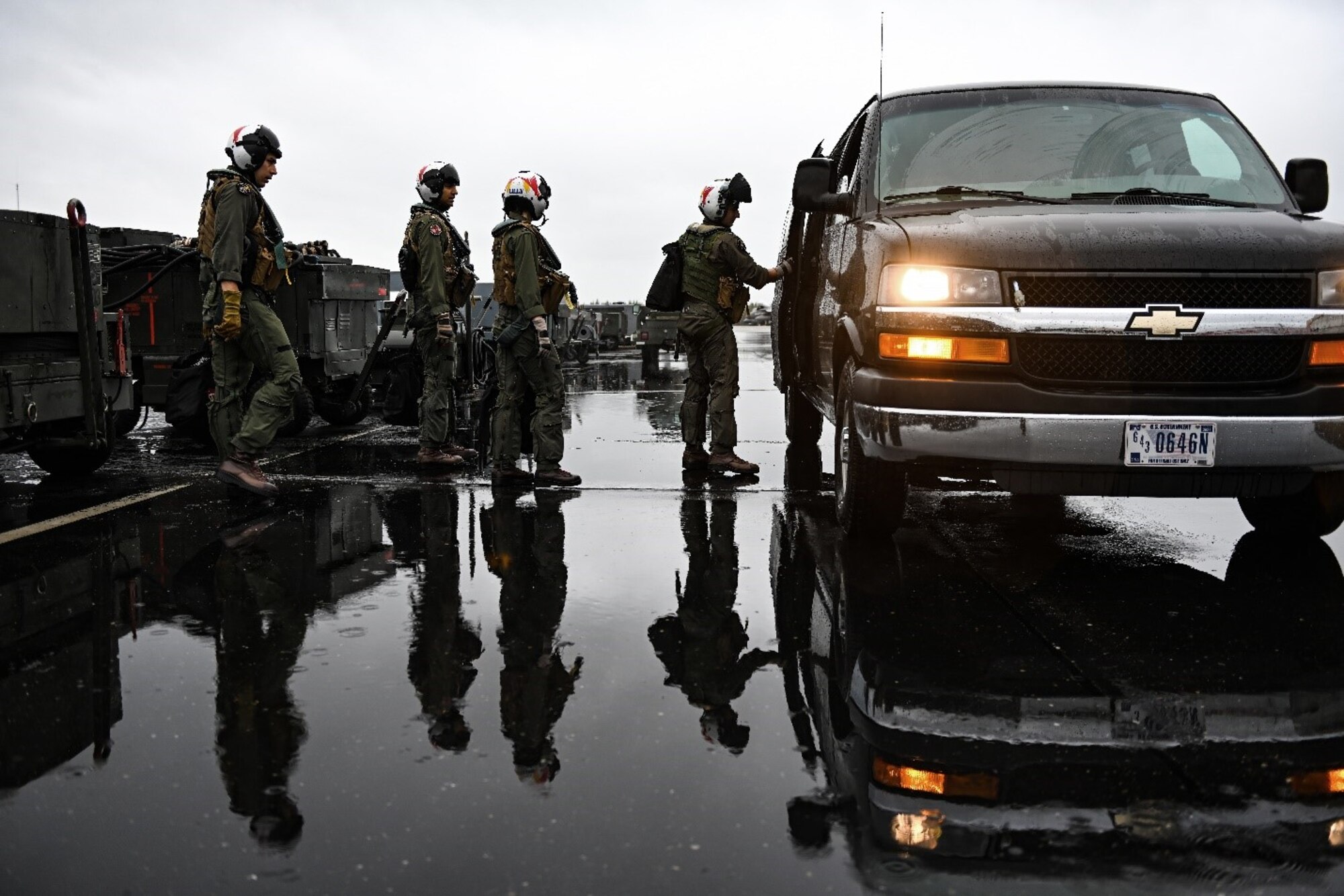 U.S. Air Force F-35A Lightning II pilots enter a van to be transported to the flight line at Eielson Air Force Base, Alaska, Aug. 16, 2021. The Aug. 12 – 27 iteration of the base’s Red Flag exercise placed a focus on fifth-generation aircraft training, including air combat simulations. (U.S. Air Force photo by Staff Sgt. Christian Conrad)