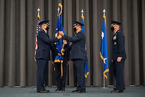 Maj. Gen. Andrew Gebara, center, incoming 8th Air Force and Joint-Global Strike Operations Center commander, receives the guidon from Gen. Tim Ray, commander of Air Force Global Strike Command, during a change of command ceremony at Barksdale Air Force Base, La., August 16, 2021. The passing of a unit’s guidon symbolizes a transfer of command. (U.S. Air Force photo by Staff Sgt. Bria Hughes)