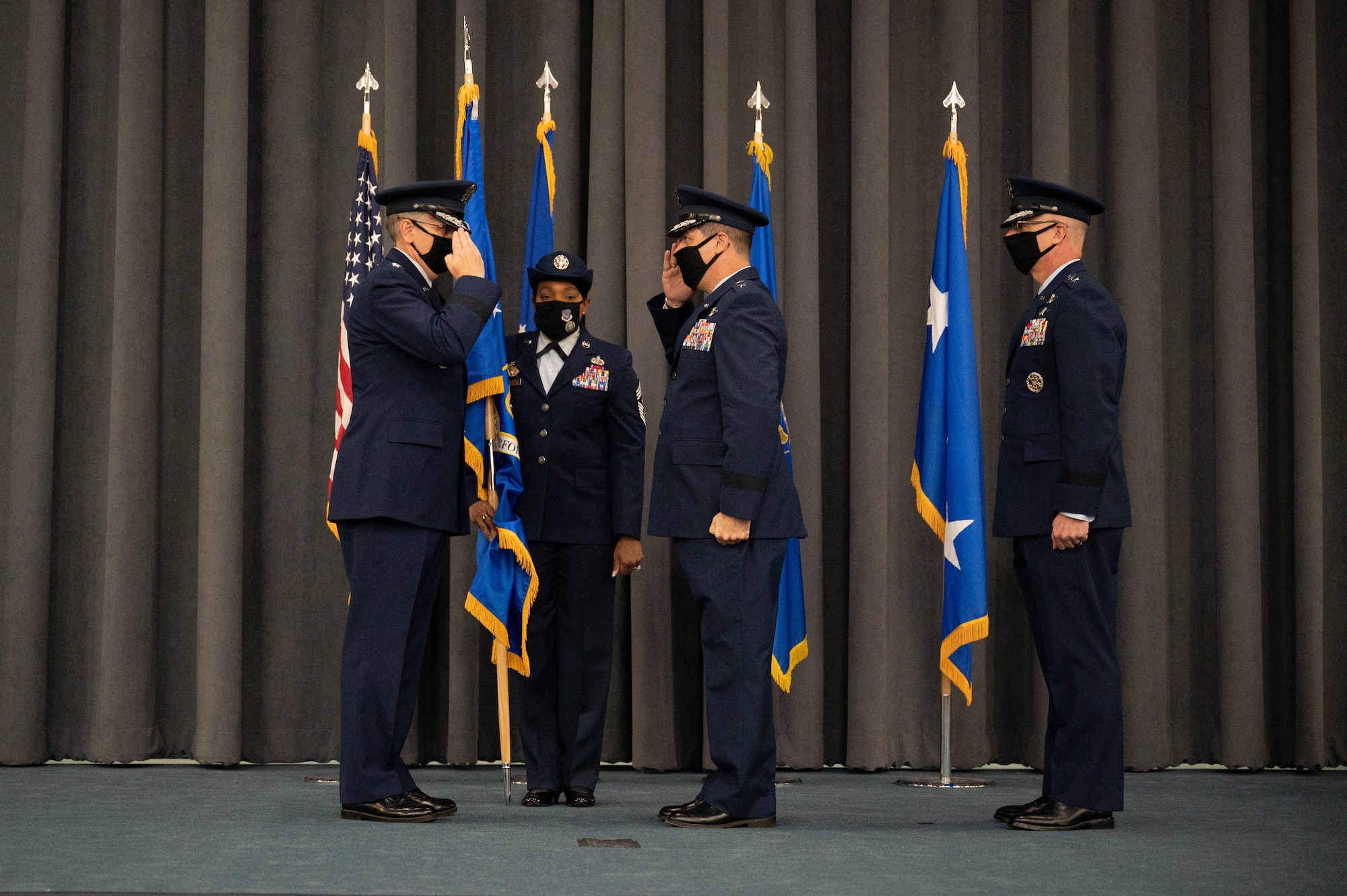 Maj. Gen. Andrew Gebara, center, incoming 8th Air Force and Joint-Global Strike Operations Center commander, renders a salute to Gen. Tim Ray, left, commander of Air Force Global Strike Command, during a change of command ceremony at Barksdale Air Force Base, La., August 16, 2021. A change of command is a military tradition that represents a formal transfer of authority and responsibility for a unit from one commanding or flag officer to another. (U.S. Air Force photo by Staff Sgt. Bria Hughes)