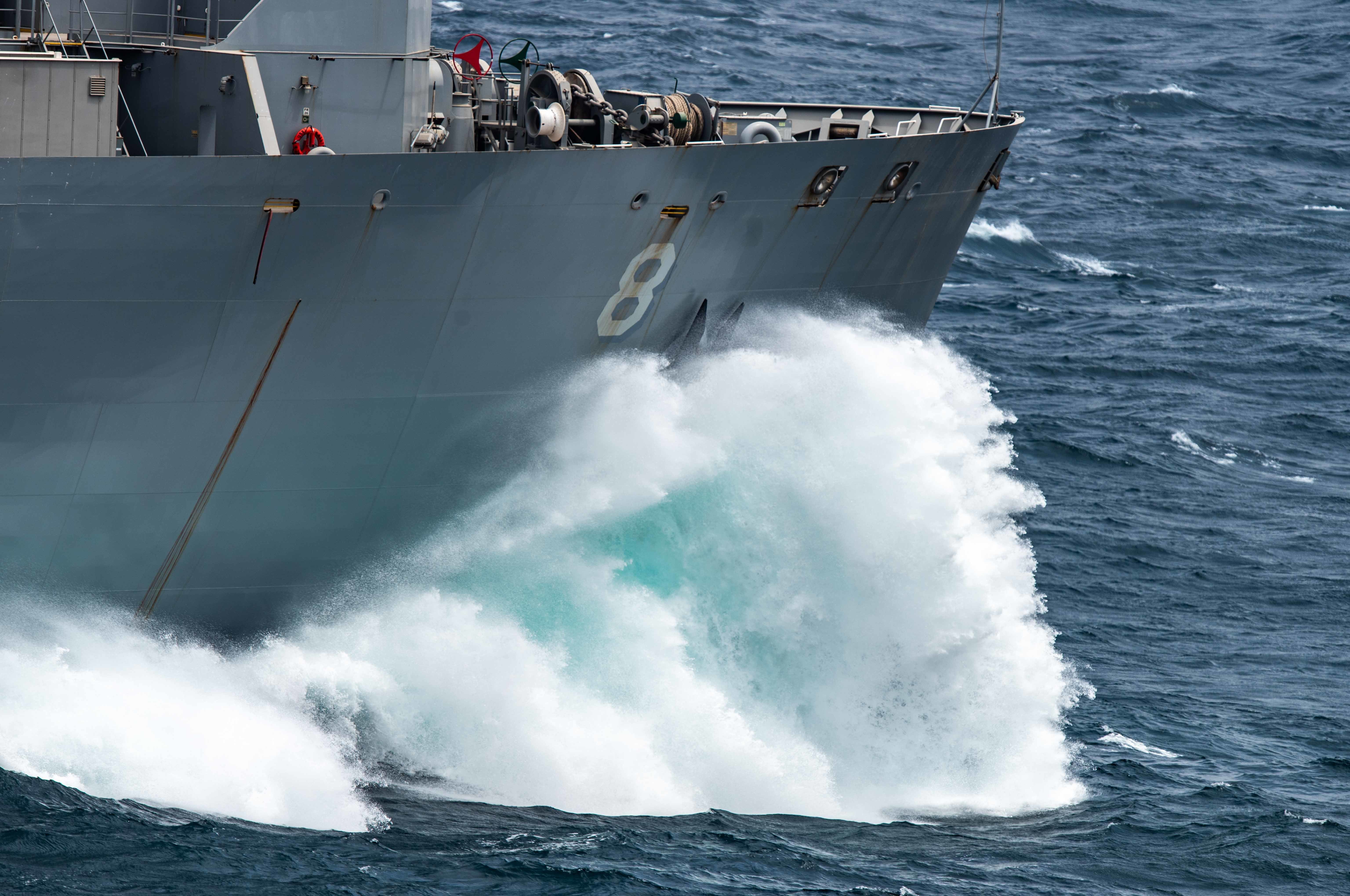 ARABIAN SEA (Aug. 13, 2021) The Military Sealift Command dry cargo and ammunition ship USNS Wally Schirra (T-AKE 8) steams ahead during a vertical replenishment.