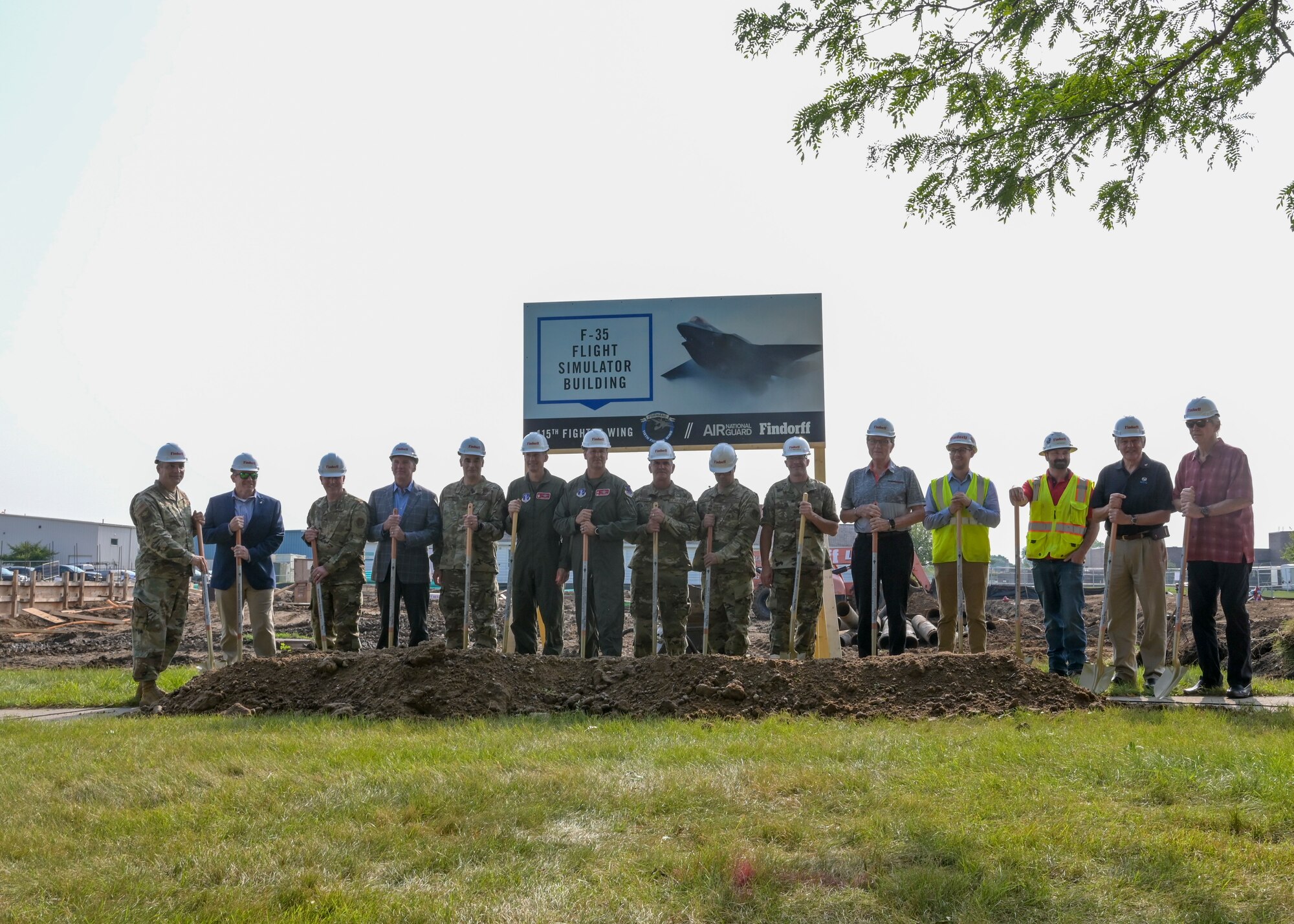 Leadership personnel from the Wisconsin Air National Guard and local organizations prepare to break ground Aug. 11, 2021 for the 115th Fighter Wing's first major project leading up to the beddown of the F-35 Lightning II at Truax Field. The ceremony brought together military and civilian leadership to commemorate the future of the Madison unit as the selected beddown site of the F-35 Lightning II aircraft. (U.S. Air National Guard photo by Staff Sgt. Cameron Lewis)