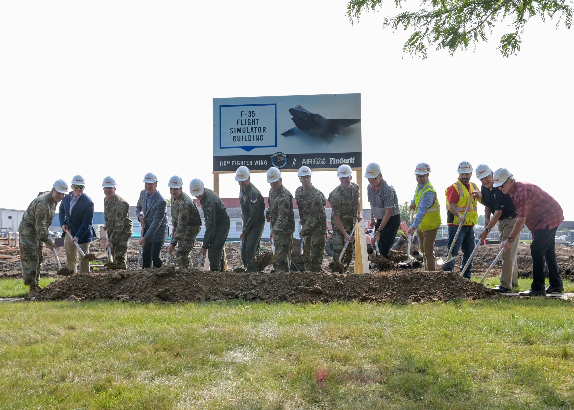 Leadership personnel from the Wisconsin Air National Guard and local organizations break ground Aug. 11, 2021 at the 115th Fighter Wing's first major project leading up to the beddown of the F-35 Lightning II at Truax Field. The ceremony brought together military and civilian leadership to commemorate the future of the Madison unit as the selected beddown site of the F-35 Lightning II aircraft. (U.S. Air National Guard photo by Staff Sgt. Cameron Lewis)