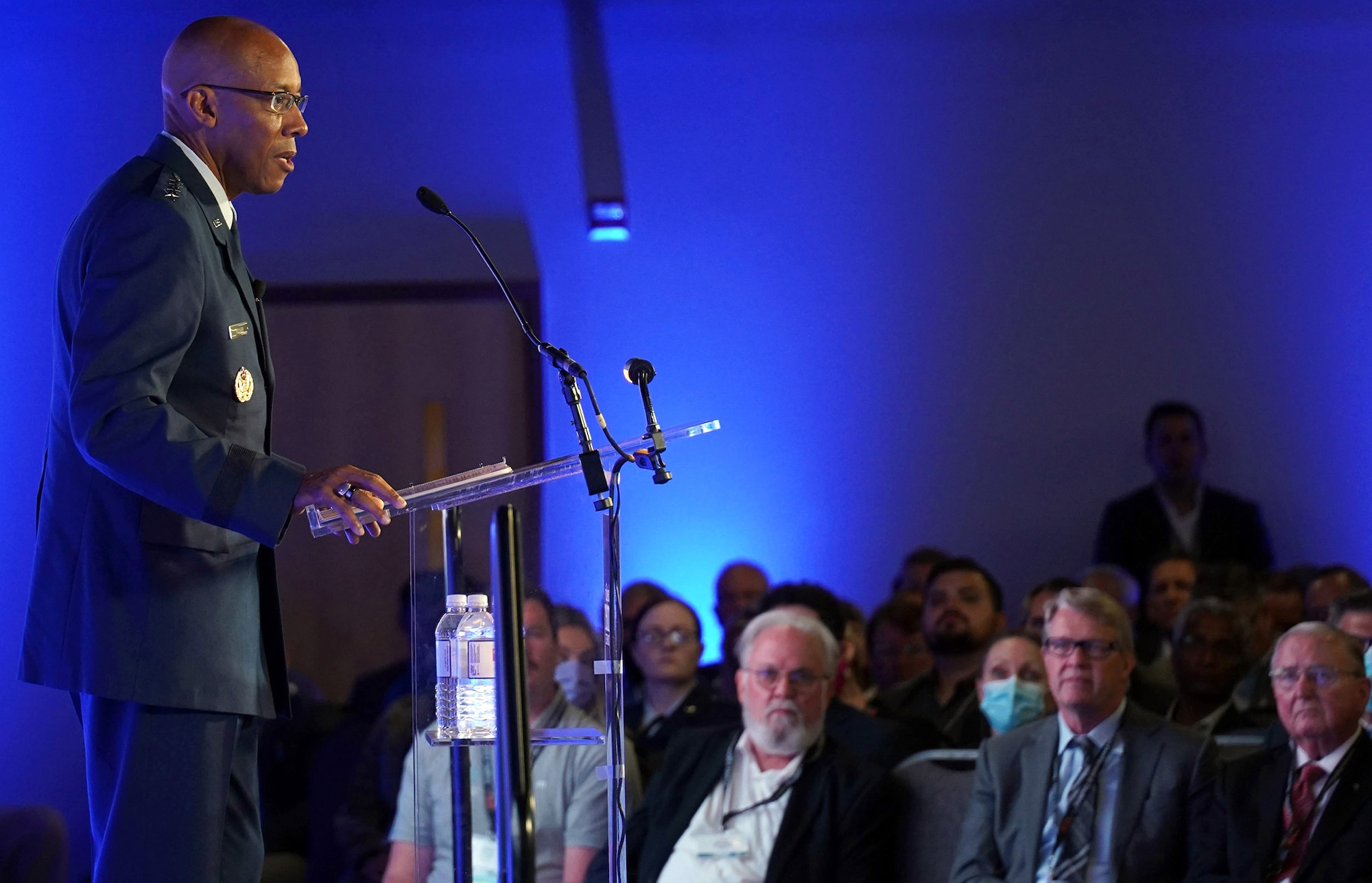 Man speaking at a podium