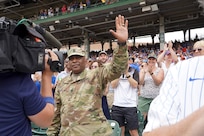 U.S. Army Reserve Command Sgt. Maj Theodore Dewitt is honored for his service during a Chicago Cubs home game, at Wrigley Field in Chicago, August 12, 2021.