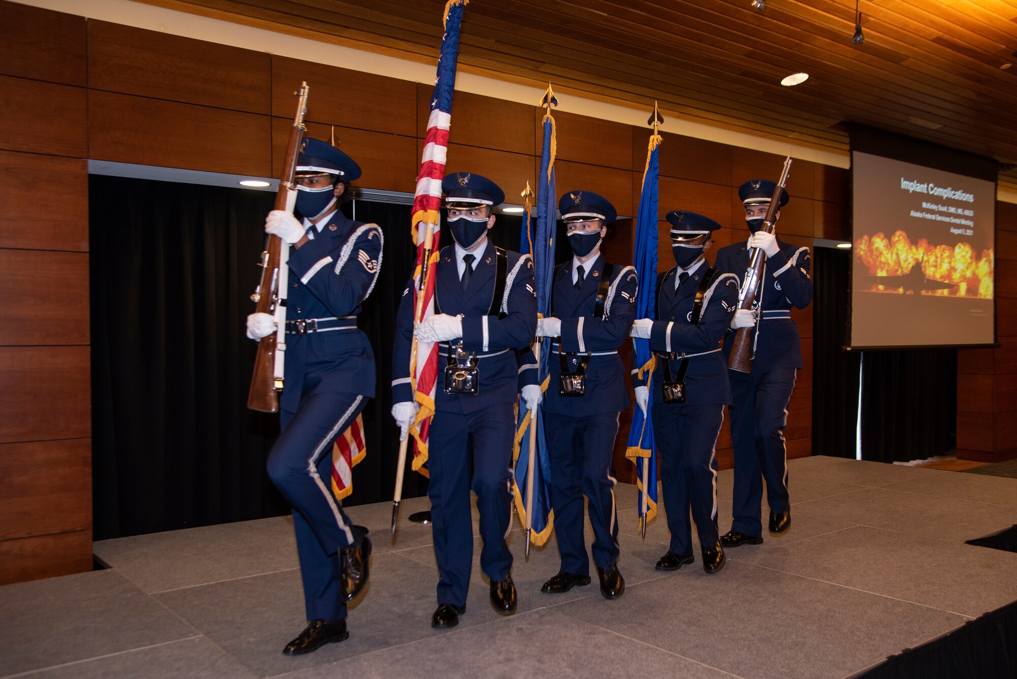 U.S. Air Force ceremonial guardsmen with the Joint Base Elmendorf-Richardson Honor Guard present the colors during the 32nd Annual Federal Services Dental Meeting at the Arctic Warrior Event Center at JBER, Alaska, Aug. 5, 2021.