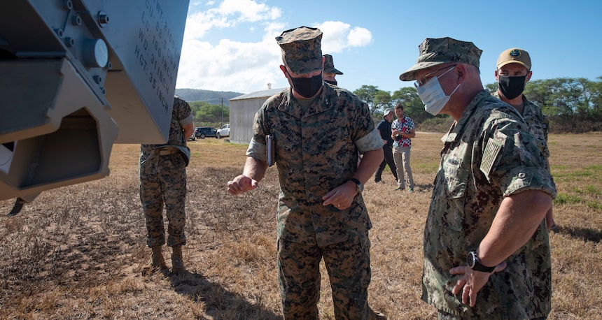 KANEOHE BAY, Hi. (Aug. 15, 2021) Chief of Naval Operations (CNO) Adm. Mike Gilday speaks with Maj. Gen. James W. Bierman during a visit to Kaneohe Bay, Hawaii as part of Large Scale Exercise 2021. (U.S. Navy photo by Mass Communication Specialist 1st Class Sarah Villegas/Released)