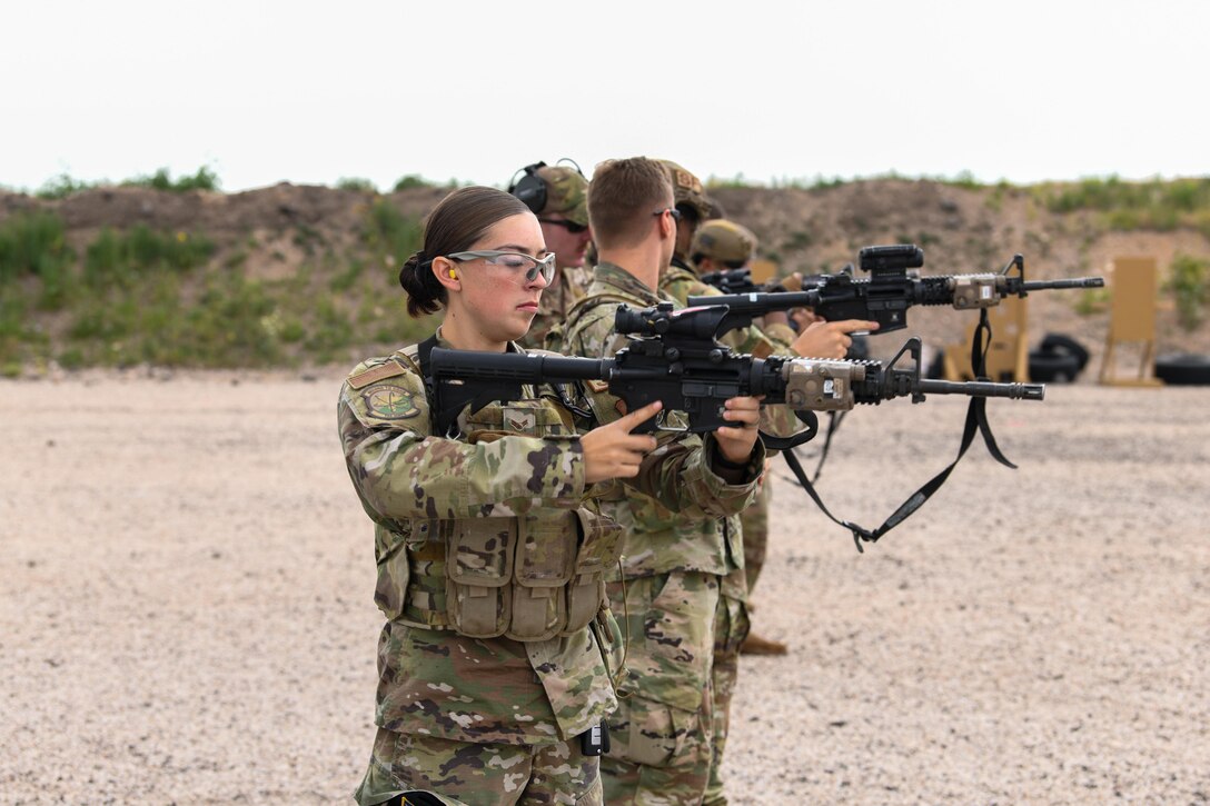 Airmen from the 90th Security Forces Squadron line up to shoot an M4 rifle during the SFS Global Strike Challenge tryouts at F.E. Warren Air Force Base, Wyoming, June 8, 2021. Teams from across Air Force Global Strike Command will compete in events that require physical strength and endurance to prove their capabilities on the team. (U.S. Air Force photo by Airman 1st Class Faith Iris MacIlvaine)