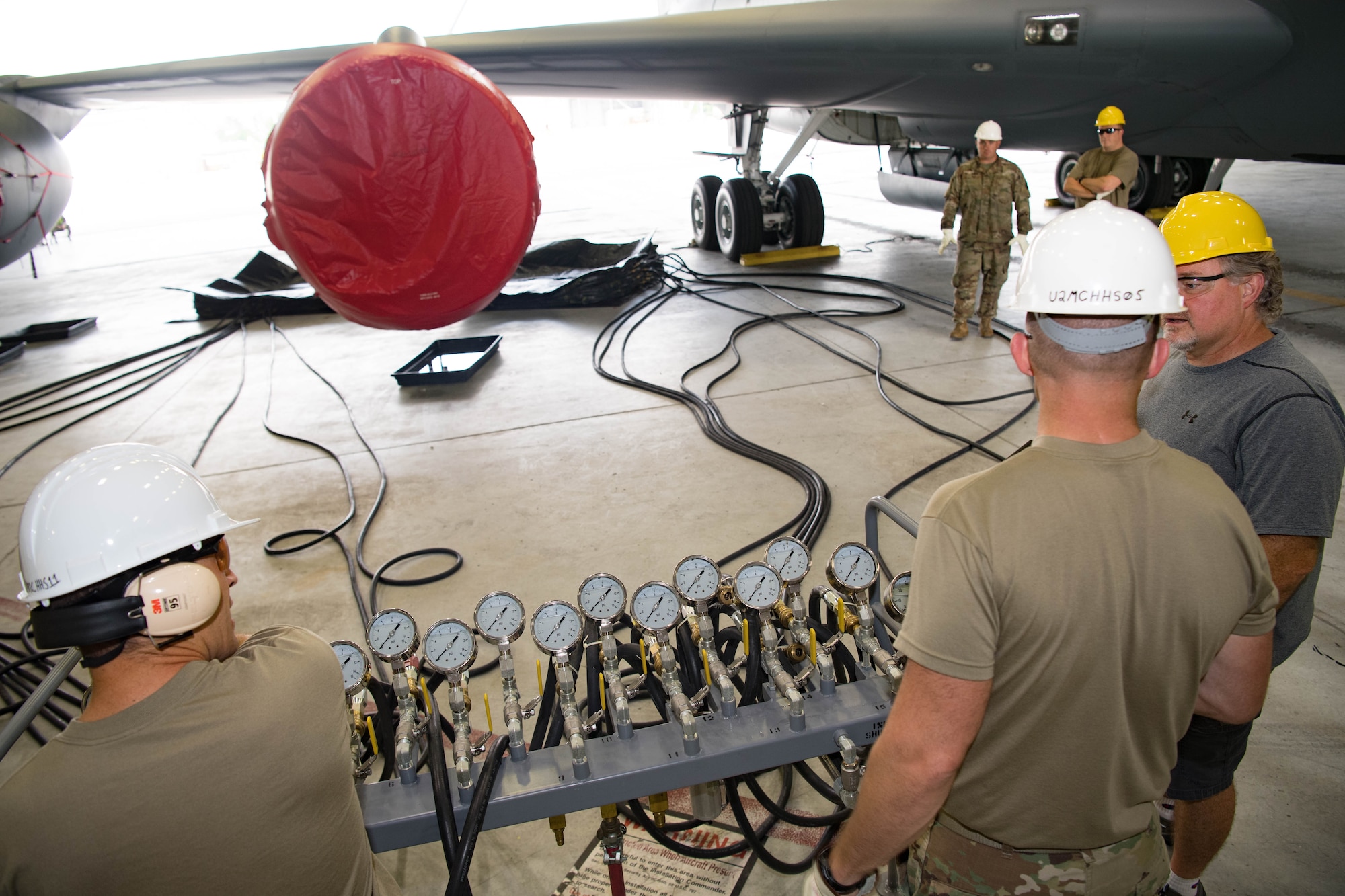 Airmen assigned to the 434th Maintenance Squadron participate in the CDDAR exercise at Grissom Air Reserve Base, Indiana, July 30, 2021. This exercise is designed to demonstrate the 434th MXS's ability to respond to a major aircraft accident within a certain time frame. (U.S. Air Force photo by Staff Sgt. Jeremy Blocker)