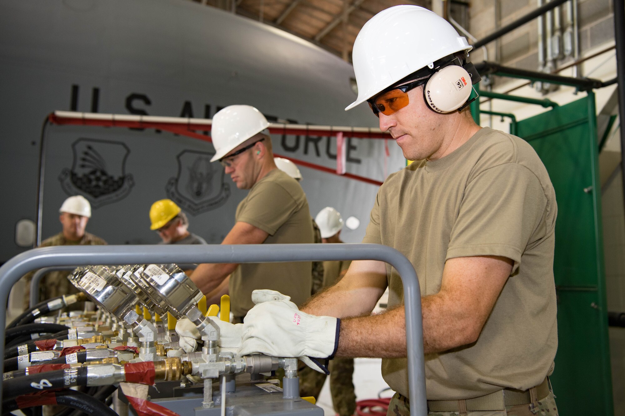 Airmen assigned to the 434th Maintenance Squadron participate in the CDDAR exercise at Grissom Air Reserve Base, Indiana, July 30, 2021. This exercise is designed to demonstrate the 434th MXS's ability to respond to a major aircraft accident within a certain time frame. (U.S. Air Force photo by Staff Sgt. Jeremy Blocker)