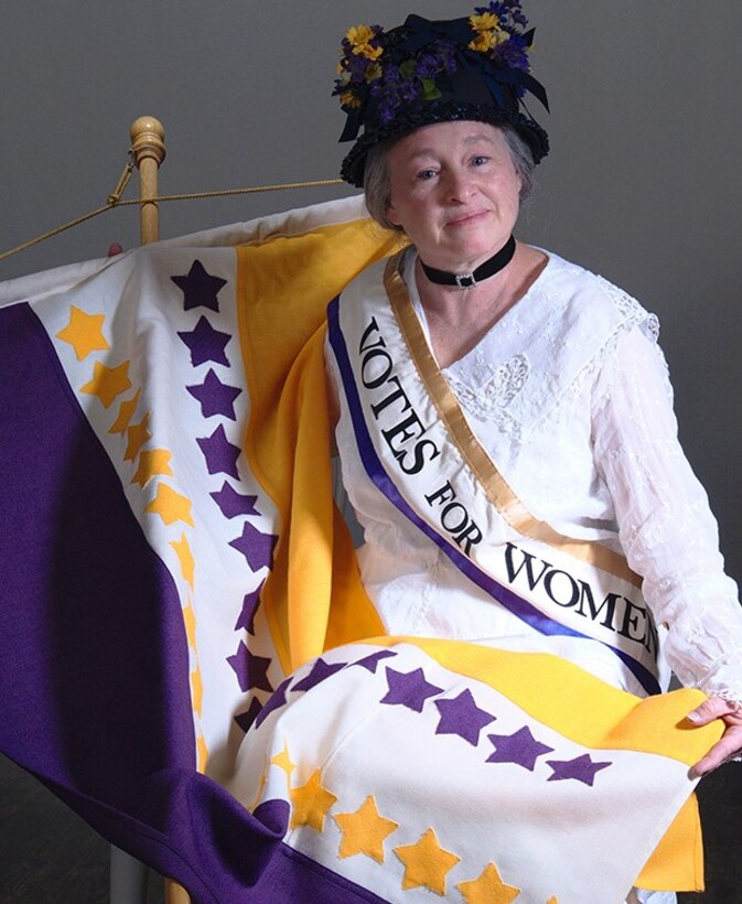 Carol Spacht, from the American Historical Theatre, portrayed Dora Lewis Philadelphia suffragist for the National Woman’s Party during a Women’s Equality Day event August 11, 2021. The event was hosted by the DLA Troop Support Equal Employment Opportunity Office and NAVSUP Weapon Systems Support EEO Advisory Committees.