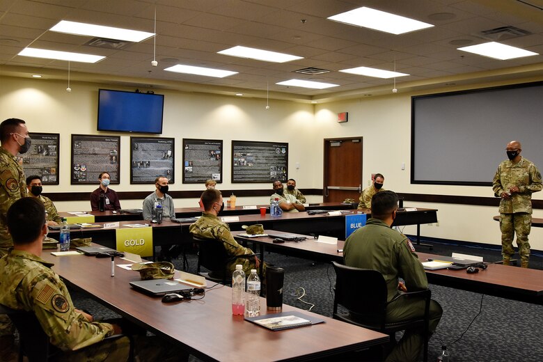 Air Force Chief of Staff Gen. CQ Brown, Jr., addresses AFOTEC 301 operational test course students during his visit to the Air Force Operational Test and Evaluation Center, Kirtland Air Force Base, N.M., Aug. 12, 2021. Brown visited the course where both Air and Space Force students are taught how to plan, execute and report operational testing throughout the acquisition of combat capability.