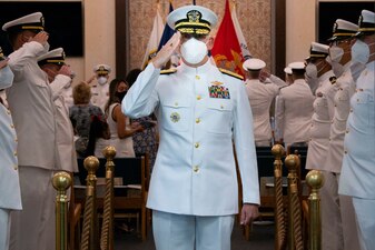 Rear Adm. Gregory Todd, Chaplain of the Marine Corps and Deputy Chief of Chaplains, passes through side boys while walking out of the Chapel of Hope, on Naval Station Newport, R.I., during a graduation ceremony for students assigned to the Naval Chaplaincy School and Center in the Basic Leadership Course, class 21030, Aug. 4. The Basic Leadership Course is a seven-week course which teaches basic knowledge of military chaplaincy as well as the fundamental skills to enable them to function effectively in a variety of sea service venues. (U.S. Navy photo by Mass Communication Specialist 2nd Class Derien C. Luce)