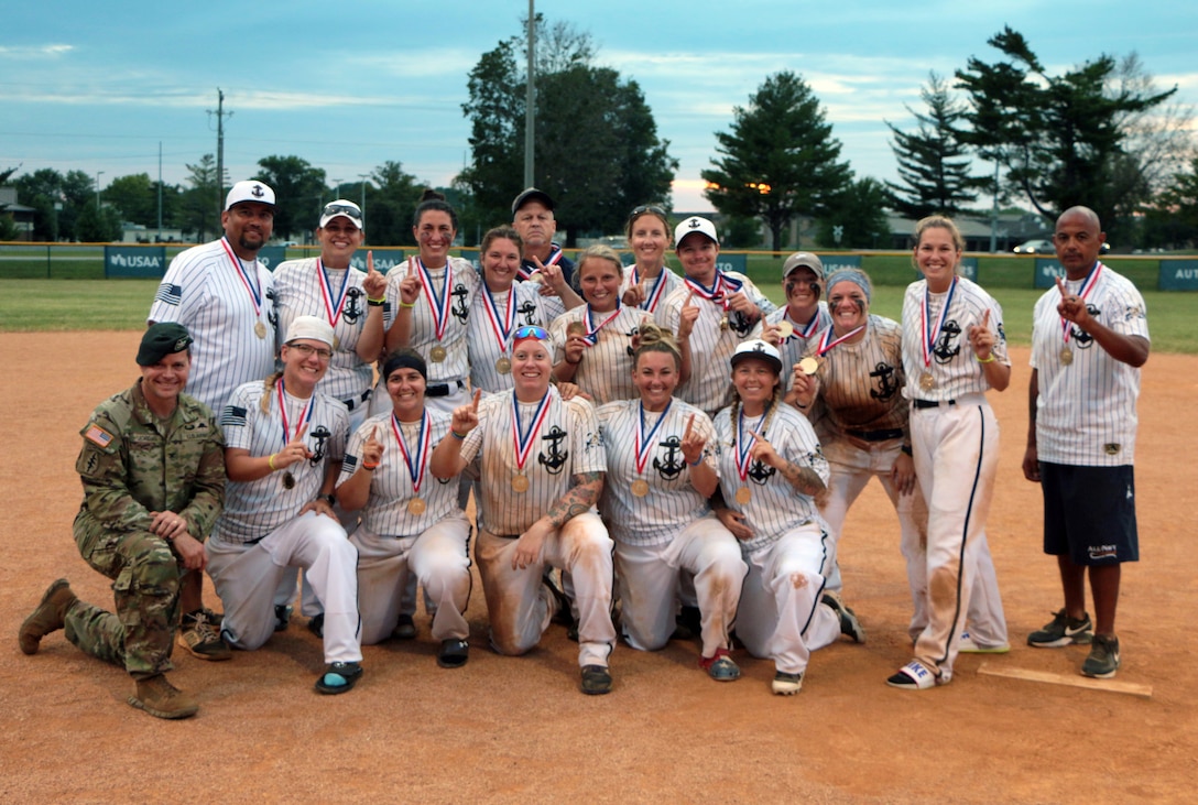 2021 Armed Forces Women's Softball Champions, U.S. Navy with the Fort Campbell Garrison Command, Col. Andrew Jordan.  U.S. Navy captures their first gold medal since 1985, defeating Air Force 20-17 in the Championship Game.  The 2021 Armed Forces Women’s Rugby Championship held at Fort Campbell, KY from 11-13 August.  Service members from the Army, Navy (with Coast Guard personnel, and Air Force (with Space Force personnel) battle it out for gold.  Visit www.ArmedForcesSports.defense.gov to learn more about the Armed Forces Sports program and the other sports offered.   (Department of Defense Photo, Released)