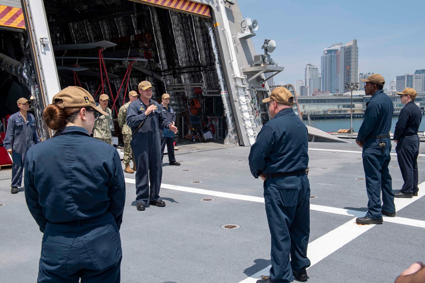 Sailors aboard Independence-variant littoral combat ship USS Charleston (LCS 18) have an all-hands call, Aug. 17. Charleston, part of Destroyer Squadron Seven, is on a rotational deployment operating in the U.S. 7th Fleet area of operation to enhance interoperability with partners and serve as a ready-response force in support of a free and open Indo-Pacific region.