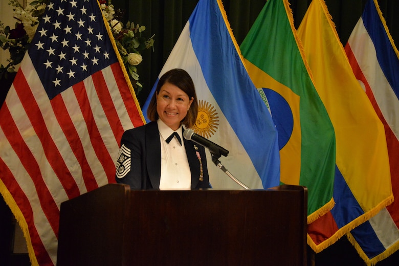 Chief Master Sgt. of the Air Force JoAnne S. Bass speaks at the Inter-American Air Forces Academy graduation banquet for Class 2021-B at Joint Base San Antonio-Lackland, Texas, Aug. 11, 2021. Class 2021-B was the largest in-person class to graduate from the IAAFA since the COVID-19 pandemic struck approximately 17 months ago.