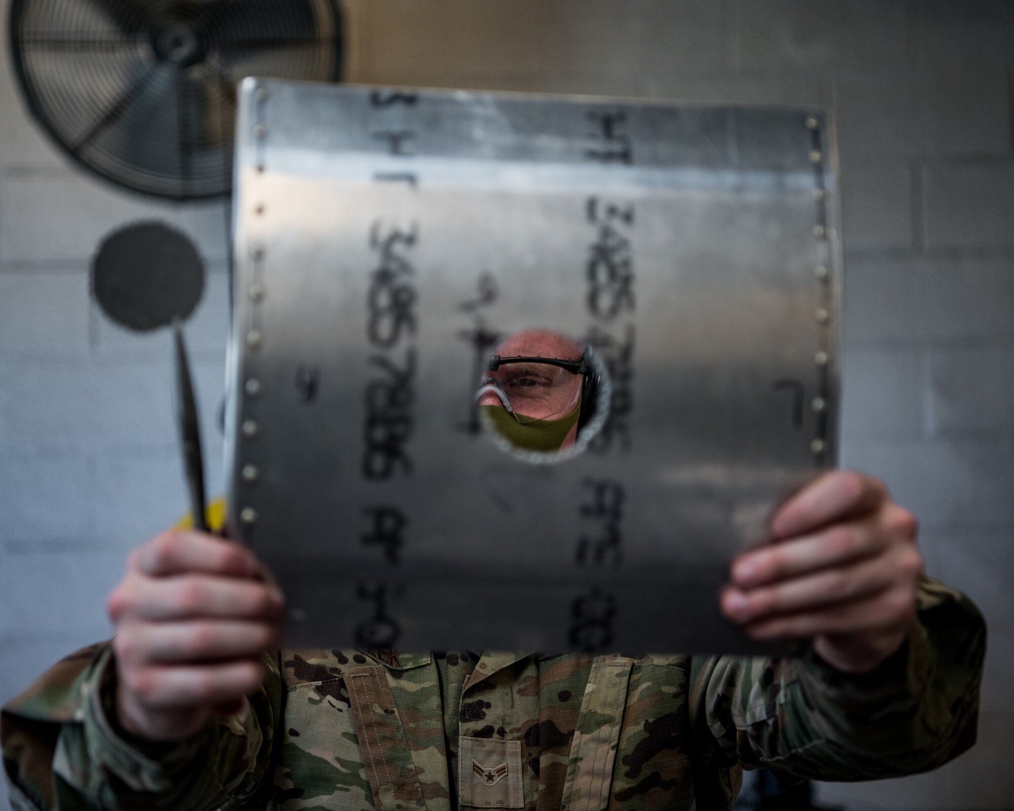 18th Equipment Maintenance Squadron aircraft structural maintenance specialists repair structures at Kadena Air Base, Japan, Aug. 16, 2021.