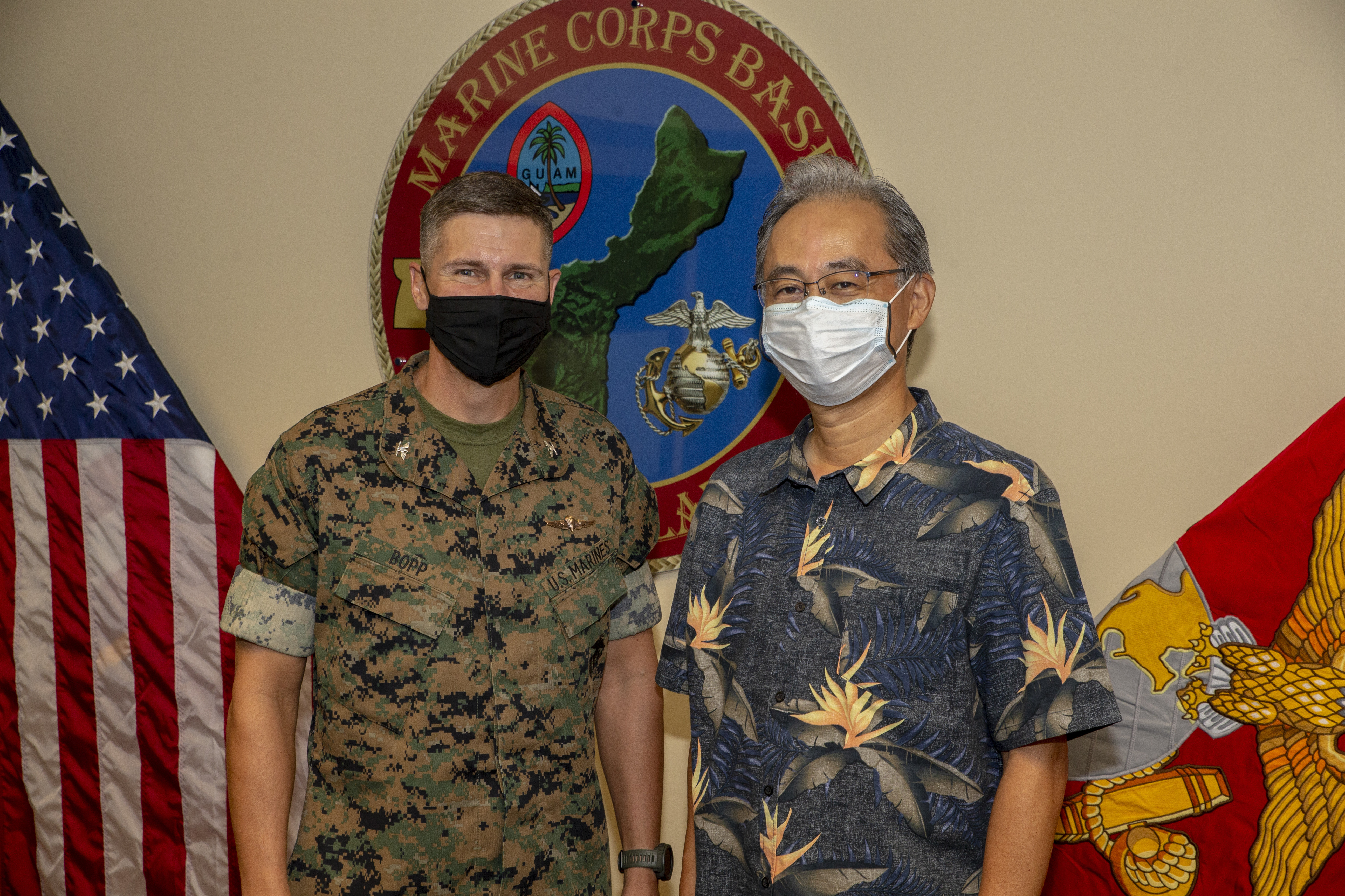 Col. Christopher Bopp, the Marine Corps Base (MCB) Camp Blaz Commanding Officer, and Consul General Toshiaki Kobayashi, with the Consulate of Japan in Hagåtña, pose for a photograph during a visit to the base Aug. 4, 2021.