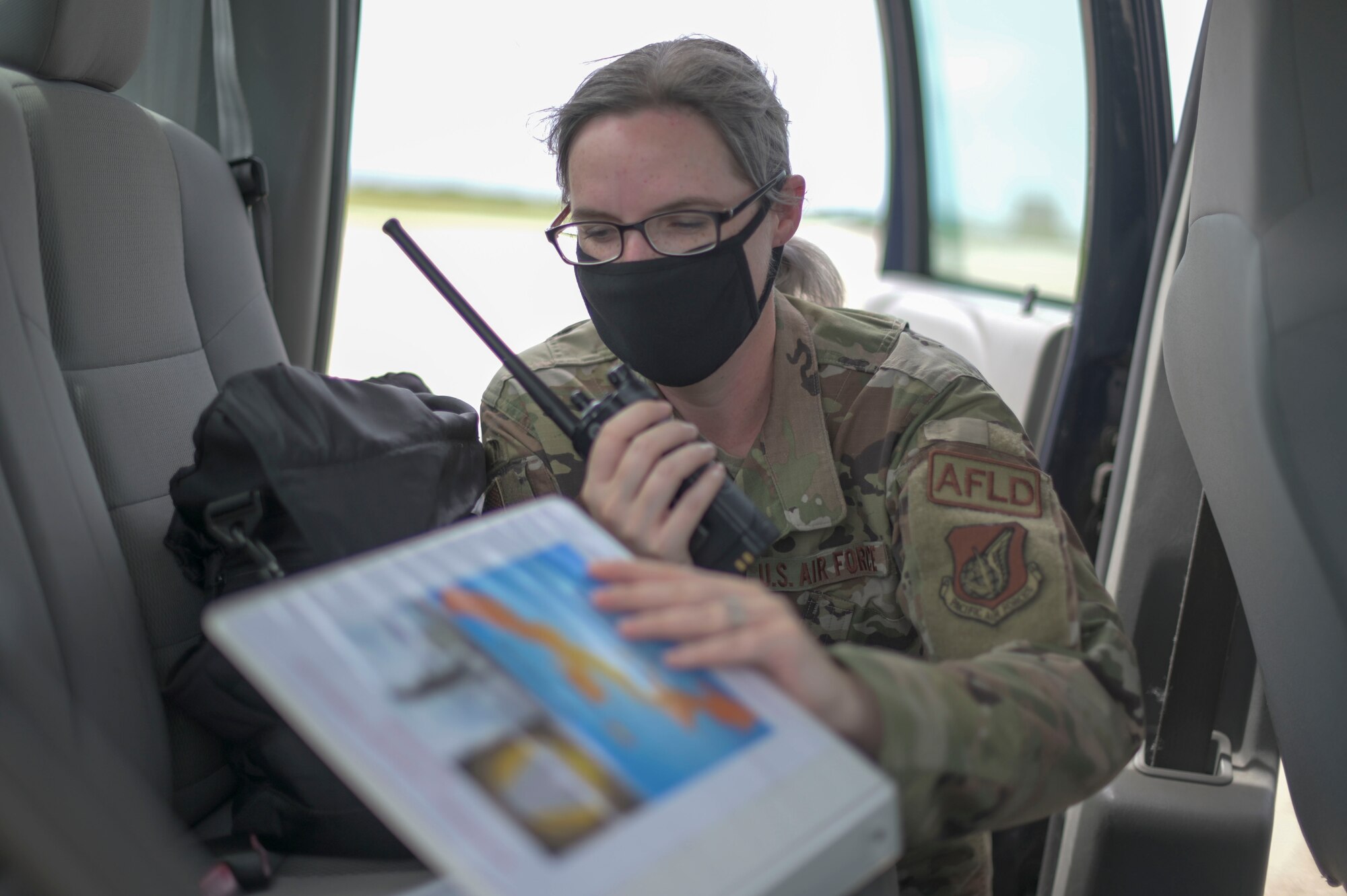18th Operation Support Squadron airfield management coordinates plans for the flight line.