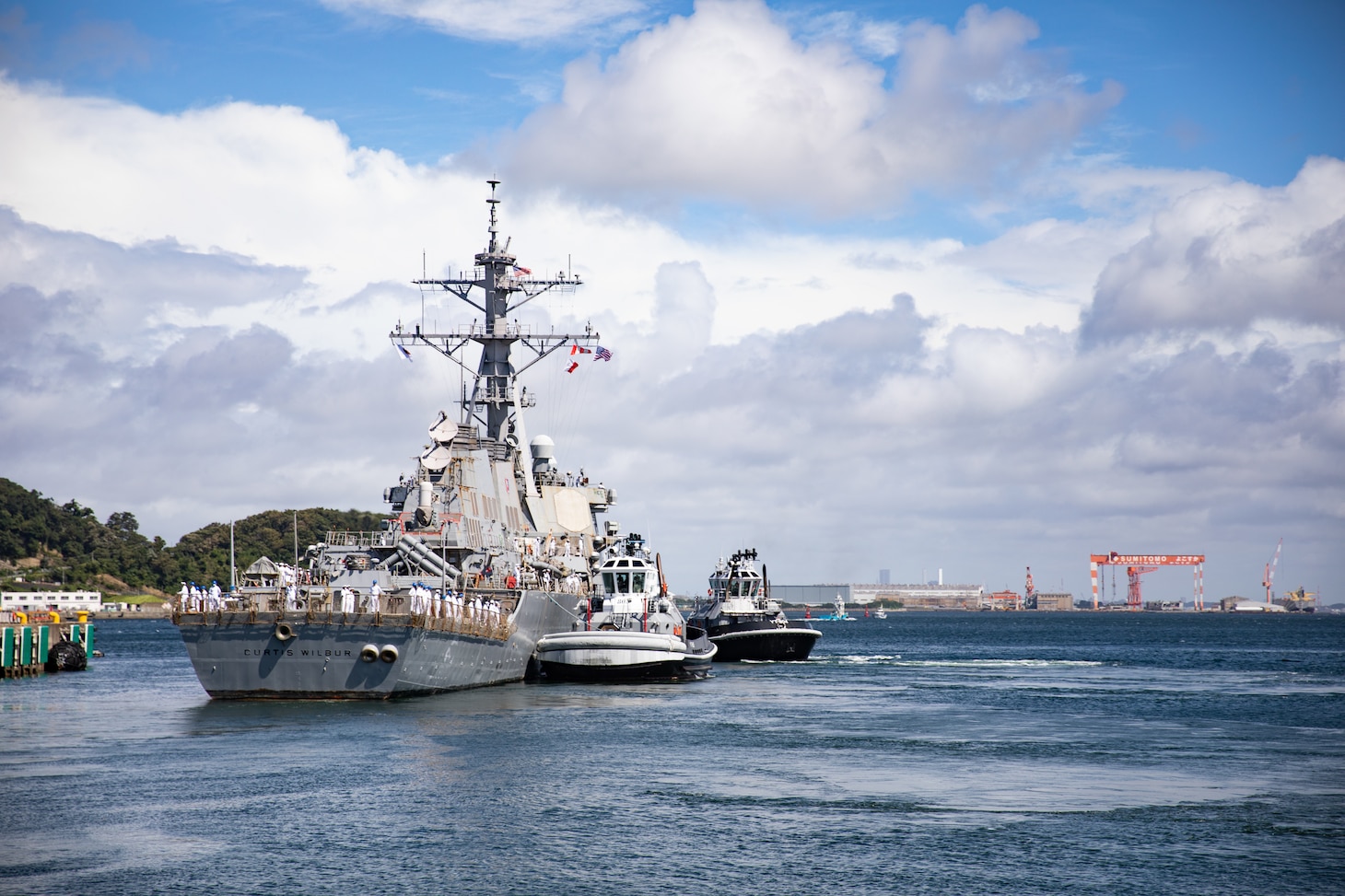 YOKOSUKA, Japan (Aug. 18, 2021) Arleigh Burke-class guided-missile destroyer USS Curtis Wilbur (DDG 54) departs Fleet Activities Yokosuka, Japan, August 18, following 25 years of service as a forward-deployed ship to U.S. 7th Fleet. Curtis Wilbur is scheduled to join U.S. 3rd Fleet, which leads naval forces in the Indo-Pacific and provides the realistic, relevant training necessary for an effective global Navy.