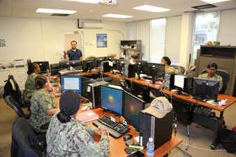 PENSACOLA, Fla. (June 14, 2021) Fleet subject matter experts review and develop exam material for the Navy-wide advancement exam for their respective ratings during an Advancement Examination Readiness Review (AERR). AERR members work to develop E-4 to E-7 examinations for future advancement cycles.