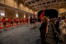 Marines with the Official U.S. Marine Corps Color Guard present the National Ensign during the Friday Evening Parade at Marine Barracks Washington, Aug. 13, 2021.