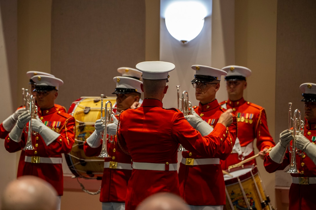 Marines with “The Commandant’s Own,” U.S. Marine Drum and Bugle Corps, perform during the Friday Evening Parade at Marine Barracks Washington, Aug. 13, 2021. The hosting official for the evening was the 19th Sergeant Major of the Marine Corps, Sgt. Maj. Troy E. Black, and the guests of honor were former Sergeants Major of the Marine Corps, Sergeants Maj. Alford L. McMichael, John L. Estrada, Michael P. Barrett, and Ronald L. Green. (U.S. Marine Corps photo by Lance Cpl. Mark Morales)