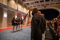 Marines with the Official U.S. Marine Corps Color Guard present the National Ensign during the Brigadier General Select Orientation Course Honors Ceremony at Marine Barracks Washington, Aug. 16, 2021.