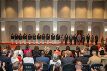 Honorees stand at the position of attention for honors during the Brigadier General Select Orientation Course Honors Ceremony at Marine Barracks Washington, Aug. 16, 2021.