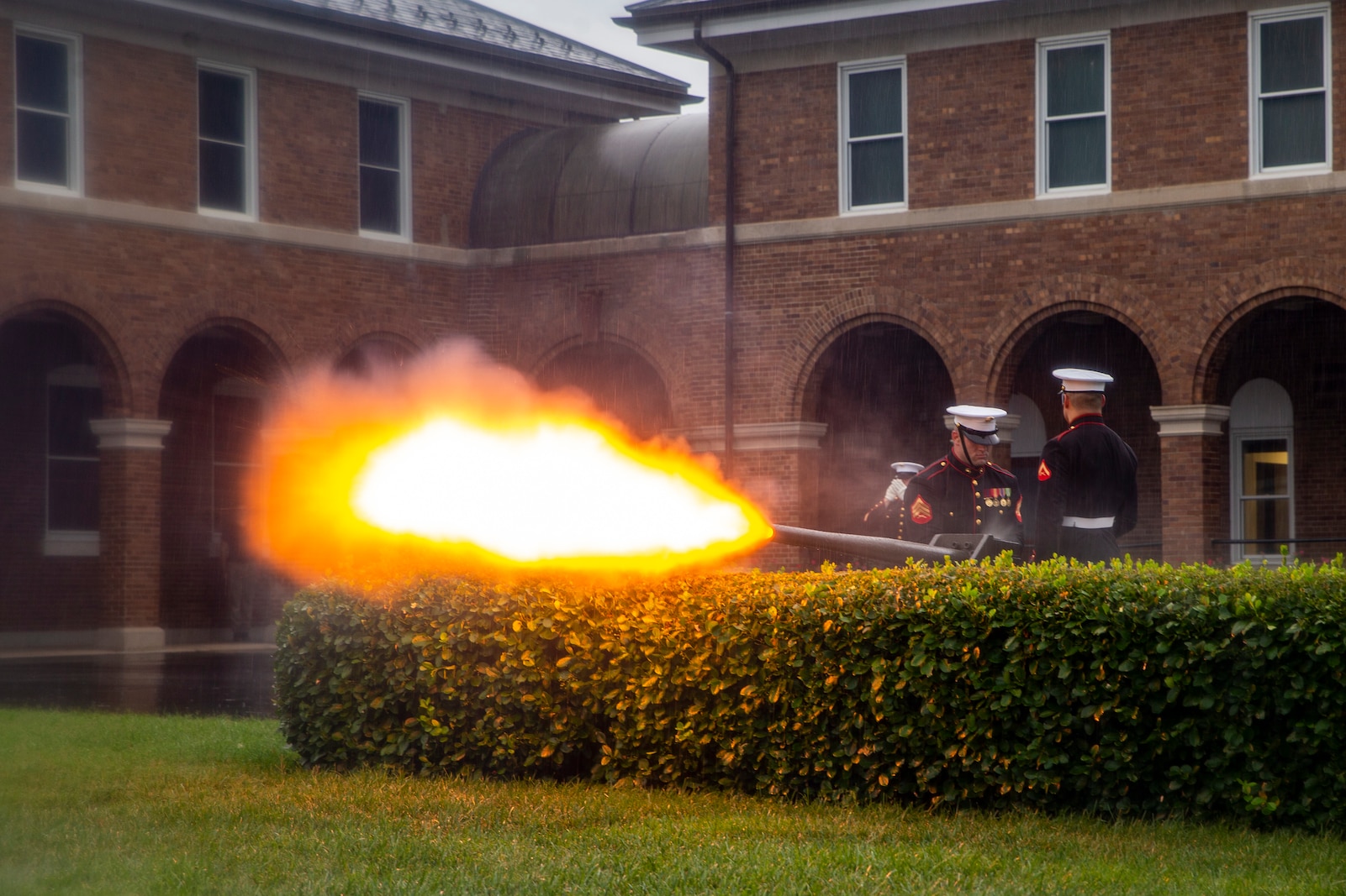 Body Bearers with Marine Barracks Washington fire an 11-round salute during the Brigadier General Select Orientation Course Honors Ceremony at Marine Barracks Washington, Aug. 16, 2021.