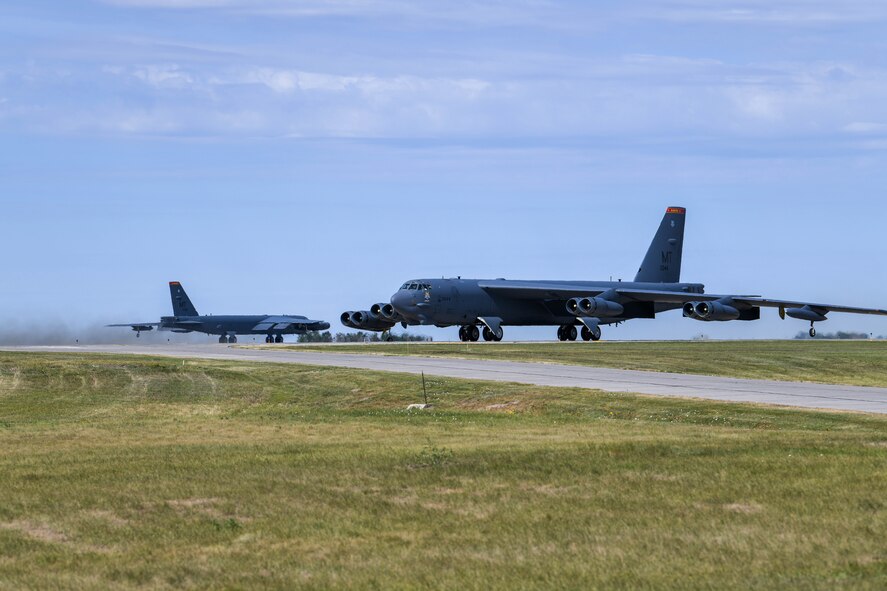 Two B-52H Stratofortress prepare for takeoff in part of Exercise Prairie Vigilance at Minot Air Force Base, N.D. Aug. 11, 2021. Prairie Vigilance tests the 5th Bomb Wing’s ability to conduct strategic-bomber readiness operations. (U.S. Air Force photo by Airman 1st Class Evan Lichtenhan)